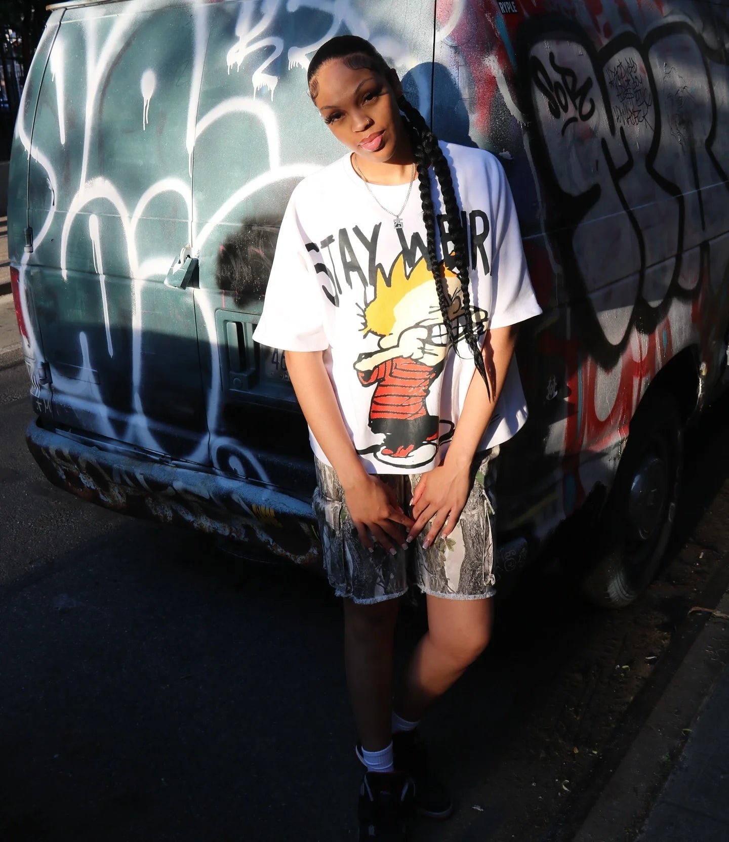 y2k hip hop graphic shirt with neon manga flicker effects
