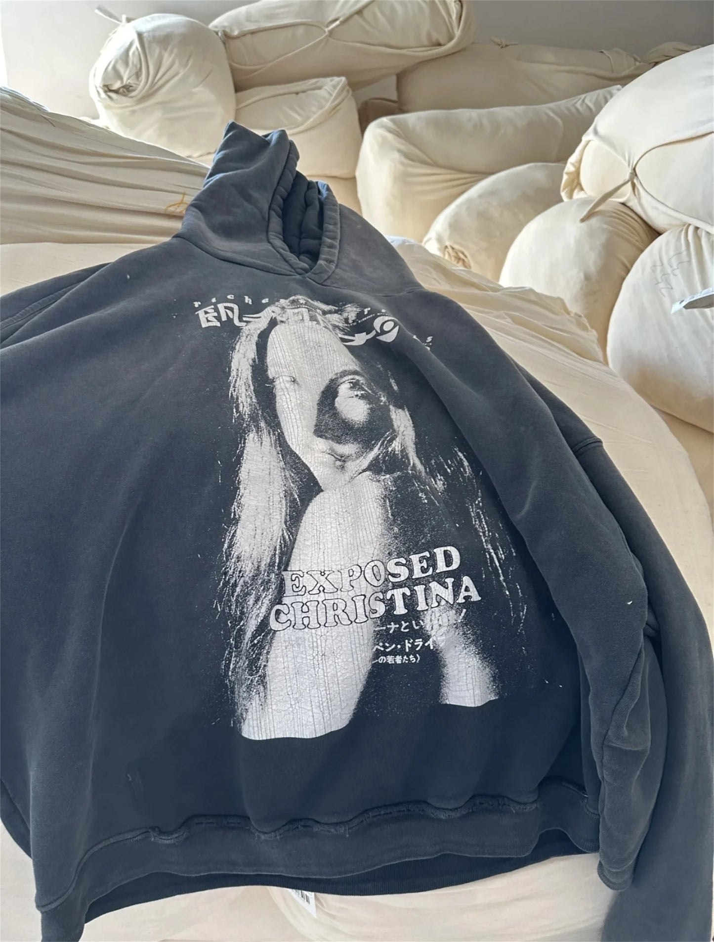 Cybernetic hoodie with sci-fi dystopian artwork