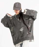 grunge knit sweater with heavyweight fabric, layered urban look for cold weather, street fashion menswear trend for seasonal 