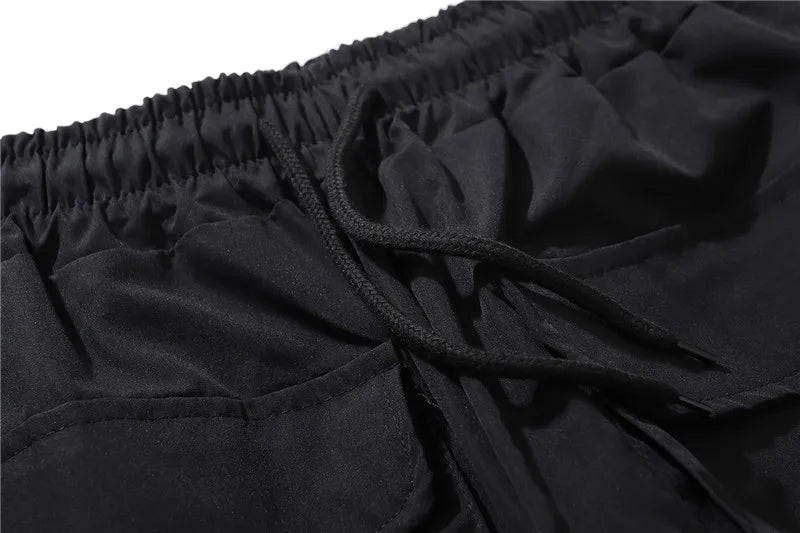 hip hop loose fit elastic waist pants cargo pockets spliced reflective lines ankle pants mens drewstring sportwear pants joggers unique joggers style 1981