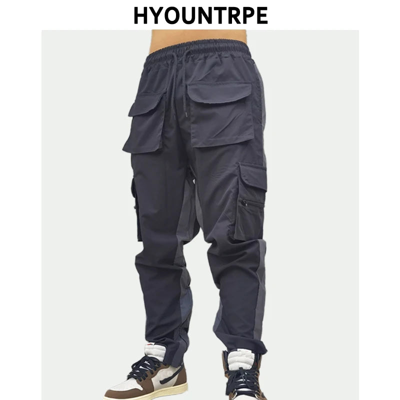 hip hop loose fit elastic waist pants cargo pockets spliced reflective lines ankle pants mens drewstring sportwear pants joggers relaxed fit joggers