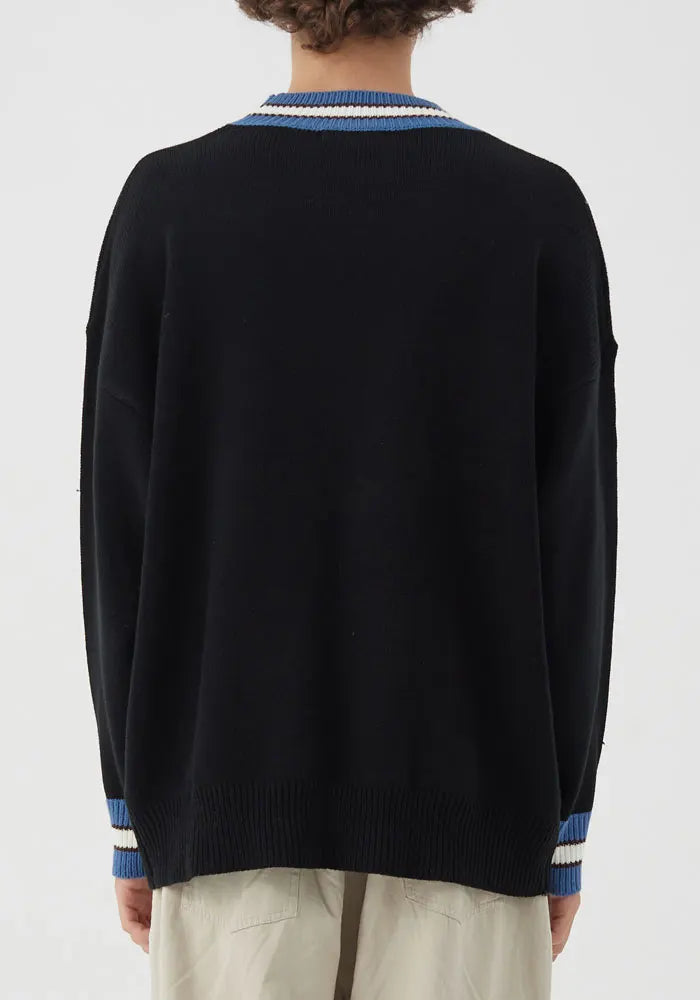 varsity flame pullover for men with bold graphic knit design, perfect for 2025 fashion, street fashion menswear trend for sea