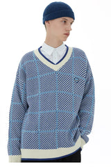 grunge knit sweater with heavyweight fabric, layered urban look for cold weather, street fashion menswear trend for seasonal 