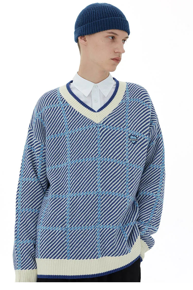 grunge knit sweater with heavyweight fabric, layered urban look for cold weather, street fashion menswear trend for seasonal 