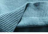 grunge knit sweater with heavyweight fabric, layered urban look for cold weather, street fashion menswear trend for seasonal 