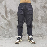 hip hop loose fit elastic waist pants cargo pockets spliced reflective lines ankle pants mens drewstring sportwear pants joggers unique joggers style 1969
