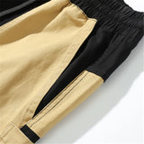 rainbowtouches men fashion retro casual splicing solid color straight cargo zipper pocket pants hip hop high street long trouser unique cargo style 3167