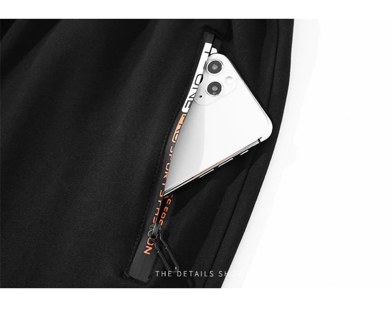 2025 autumn mens sport pants casual knitted trousers with zipper pockets solid color jogger pants male pantalon chandal hombre unique joggers style 749
