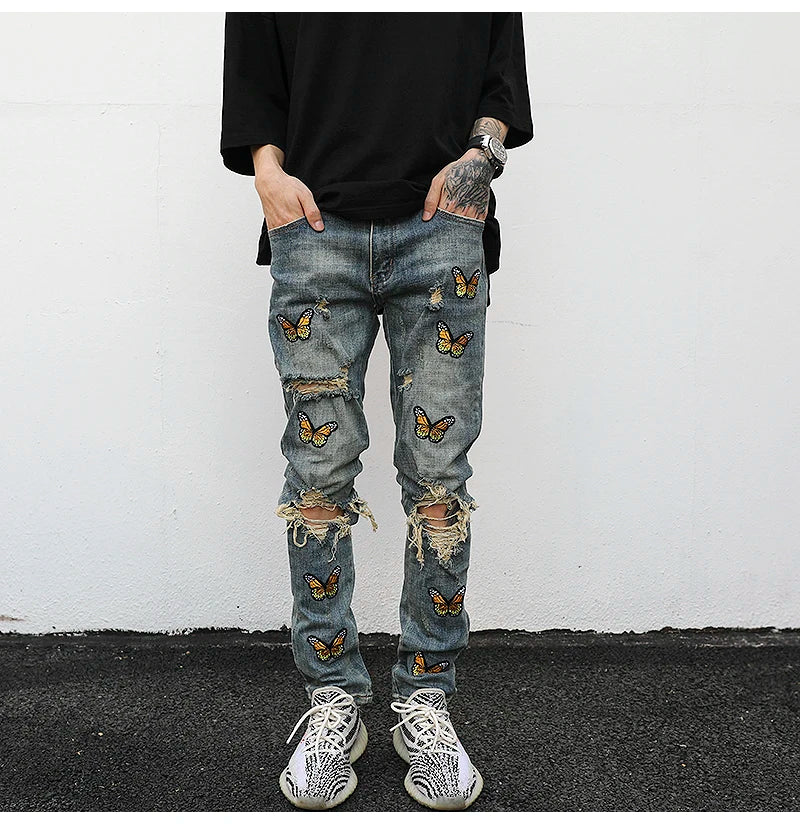 high street butterfly embroidery knee ripped hole jeans mens casual hip hop distressed jeans slim fit skinny denim pants joggers unique joggers style 1888