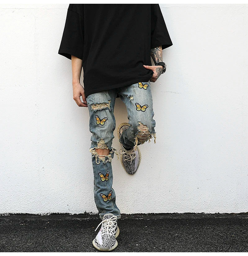 high street butterfly embroidery knee ripped hole jeans mens casual hip hop distressed jeans slim fit skinny denim pants joggers unique joggers style 1880
