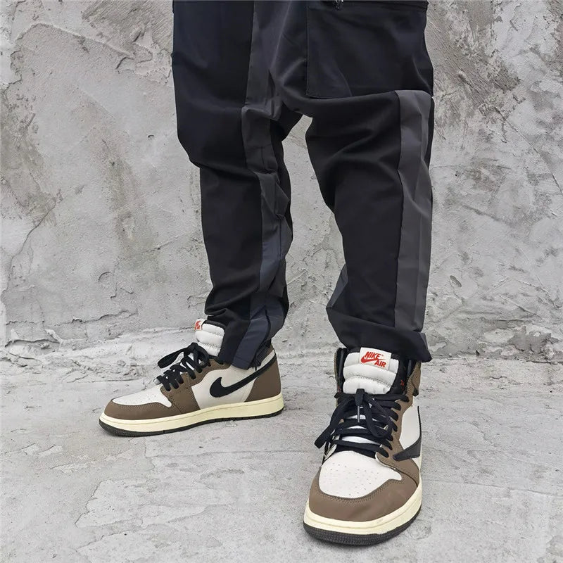 hip hop loose fit elastic waist pants cargo pockets spliced reflective lines ankle pants mens drewstring sportwear pants joggers unique joggers style 1972