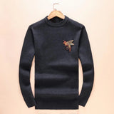 grunge knit sweater with heavyweight fabric, layered urban look for cold weather, street fashion menswear trend for seasonal 