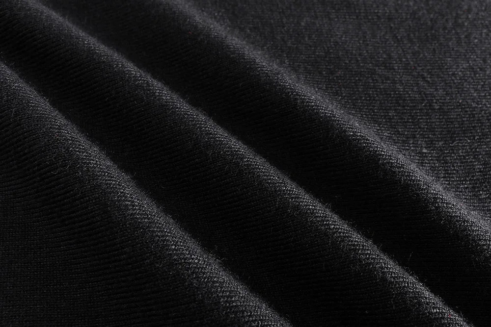 grunge knit sweater with heavyweight fabric, layered urban look for cold weather, street fashion menswear trend for seasonal 