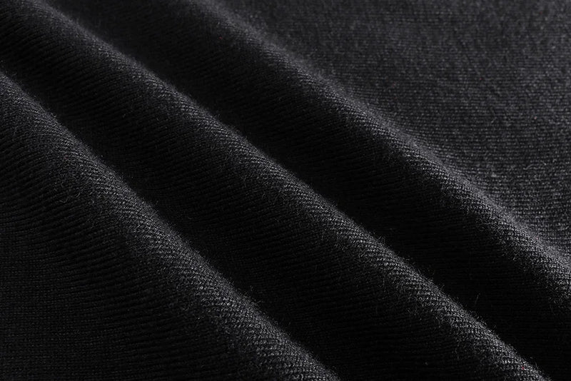 grunge knit sweater with heavyweight fabric, layered urban look for cold weather, street fashion menswear trend for seasonal 