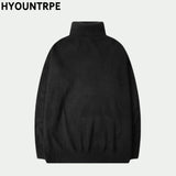 grunge knit sweater with heavyweight fabric, layered urban look for cold weather, street fashion menswear trend for seasonal 