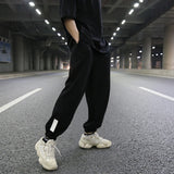 high street loose fit drawstring pants casual spring new trousers black sportswear jogger pants fashion hip hop clothing for men relaxed fit joggers