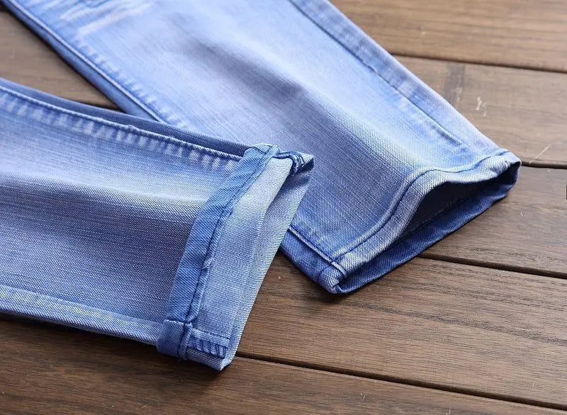 fashion ripped biker jeans denim distressed trousers slim fit zippers hip hop jeans motorcycle pants casual streetwear for men unique jeans style 1957