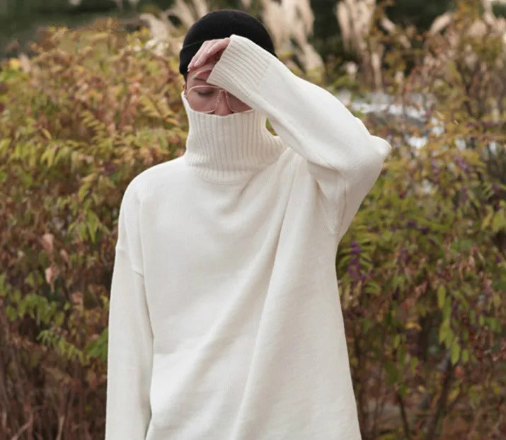 grunge knit sweater with heavyweight fabric, layered urban look for cold weather, street fashion menswear trend for seasonal 
