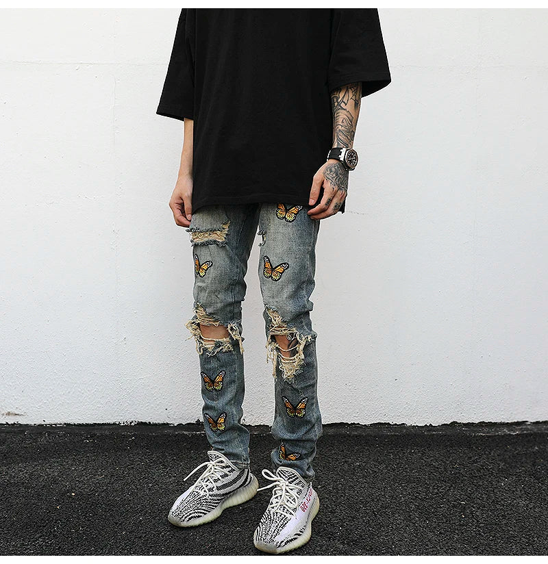high street butterfly embroidery knee ripped hole jeans mens casual hip hop distressed jeans slim fit skinny denim pants joggers unique joggers style 1882