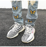 high street butterfly embroidery knee ripped hole jeans mens casual hip hop distressed jeans slim fit skinny denim pants joggers unique joggers style 1894