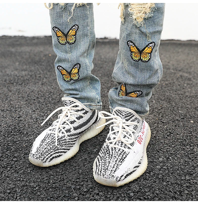 high street butterfly embroidery knee ripped hole jeans mens casual hip hop distressed jeans slim fit skinny denim pants joggers unique joggers style 1894