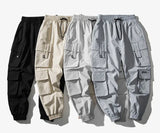 streetwear mens hip hop jogging pants casual men trousers big size loose sweatpants male 2023 new multi pocket harem pants 5xl unique joggers style 2891
