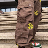 mens high street smilely loose cargo pants casual zipper straight jeans hip hop side pockets loose fit streetwear casual joggers sporty tapered joggers
