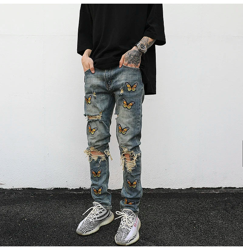 high street butterfly embroidery knee ripped hole jeans mens casual hip hop distressed jeans slim fit skinny denim pants joggers unique joggers style 1889