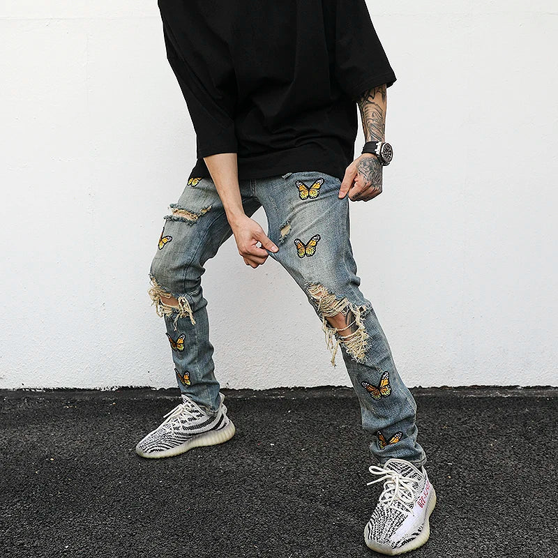 high street butterfly embroidery knee ripped hole jeans mens casual hip hop distressed jeans slim fit skinny denim pants joggers sporty tapered joggers