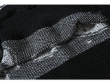 grunge knit sweater with heavyweight fabric, layered urban look for cold weather, street fashion menswear trend for seasonal 