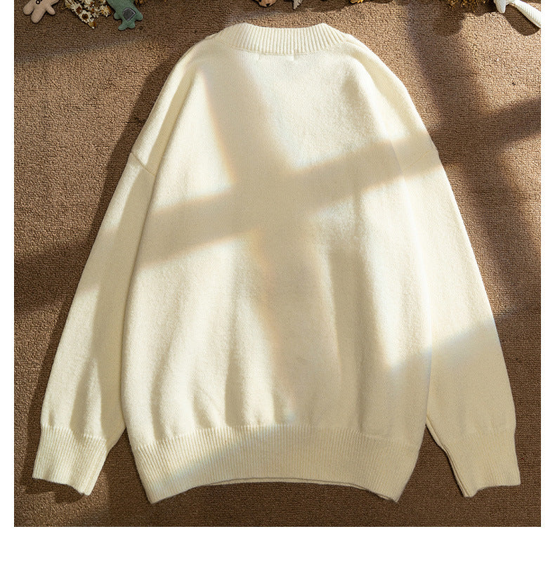 grunge knit sweater with heavyweight fabric, layered urban look for cold weather, street fashion menswear trend for seasonal 