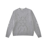 grunge knit sweater with heavyweight fabric, layered urban look for cold weather, street fashion menswear trend for seasonal 