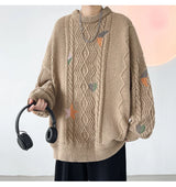 grunge knit sweater with heavyweight fabric, layered urban look for cold weather, street fashion menswear trend for seasonal 