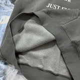 Mysterious shadow hoodie with cryptic typography print