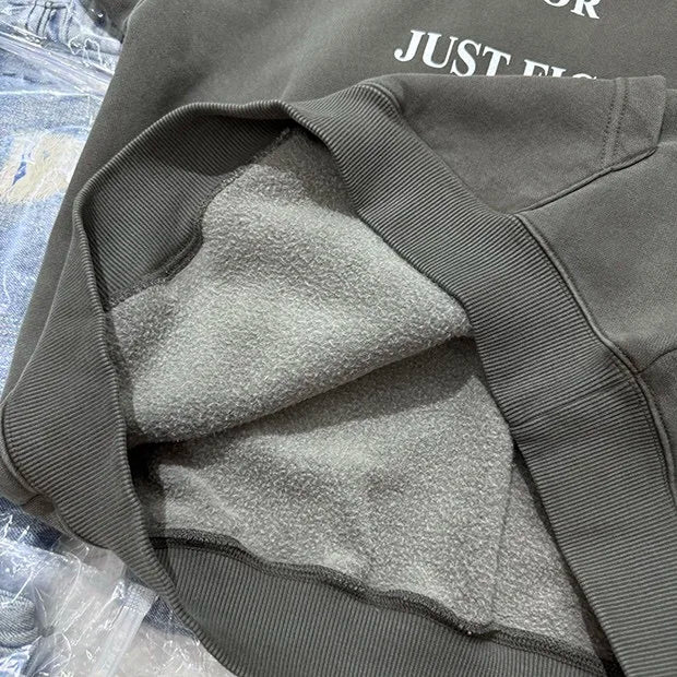 Mysterious shadow hoodie with cryptic typography print
