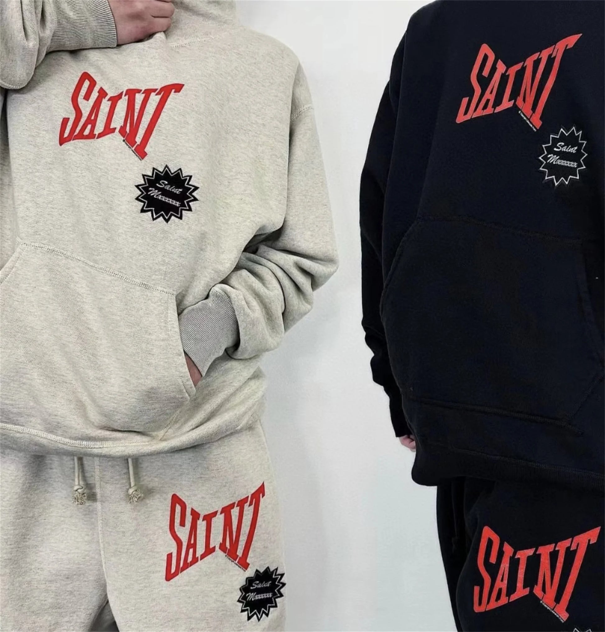 Punk rock goth hoodie with distressed lettering and chains