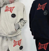 Punk rock goth hoodie with distressed lettering and chains