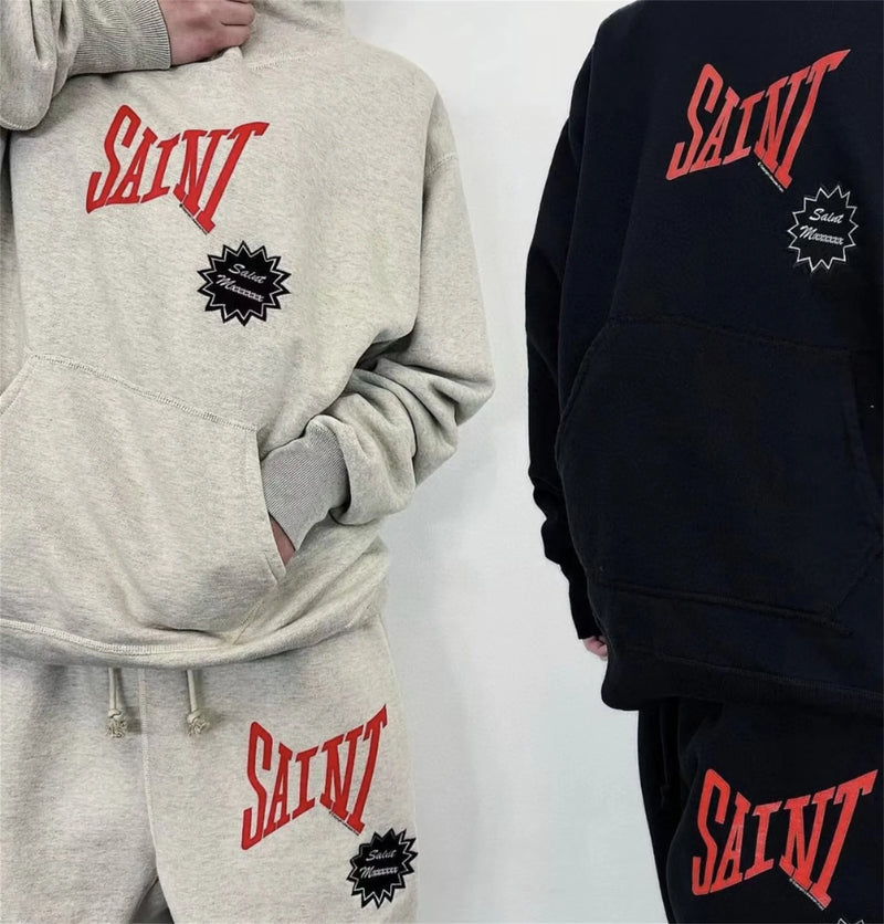 Punk rock goth hoodie with distressed lettering and chains