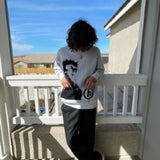 oversized flame jumper with bold print, ideal for photo-ready Y2K streetwear layering, street fashion menswear trend for seas