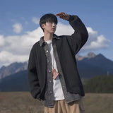 checkered varsity coat, layered streetwear look, trendy