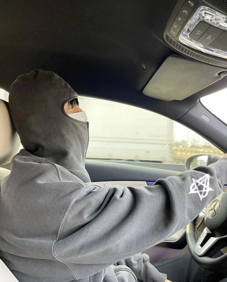 Old-school skateboarding hoodie with bold graffiti prints