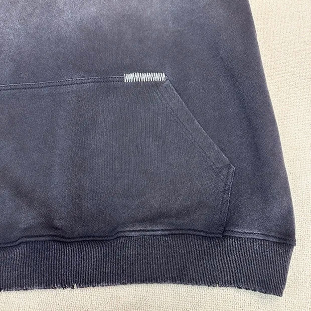 Old-school skater hoodie with DIY grunge-style graphics