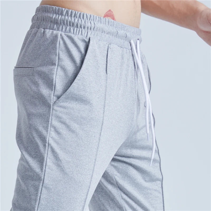 rainbowtouches new thin casual pants men fashion slim fit solid color brand trousers sweatpants elastic men workout pant relaxed fit joggers