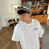 Y2K Oversized Tee – Chrome Skull Graphic with Retro Edge