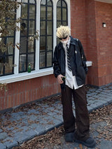bold graphic coat, high-street look, for men, fall streetwear outfit, oversized style, layered fashion, modern aesthetic, graphic detail