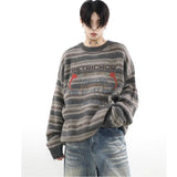 bold graphic pullover, layered streetwear look, soft knit pullover with flame design, y2k fashion statement