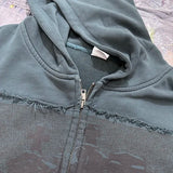 Shadowy black hoodie with eerie gothic typography