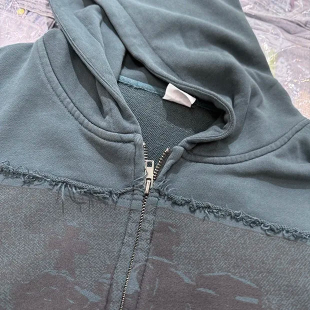 Shadowy black hoodie with eerie gothic typography