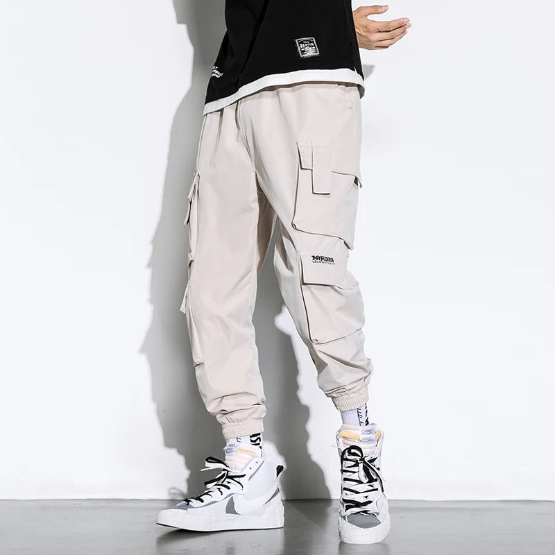 streetwear mens hip hop jogging pants casual men trousers big size loose sweatpants male 2023 new multi pocket harem pants 5xl sporty tapered joggers