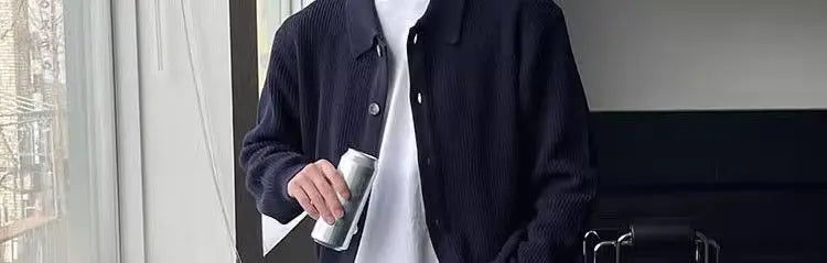 grunge knit sweater with heavyweight fabric, layered urban look for cold weather, street fashion menswear trend for seasonal 